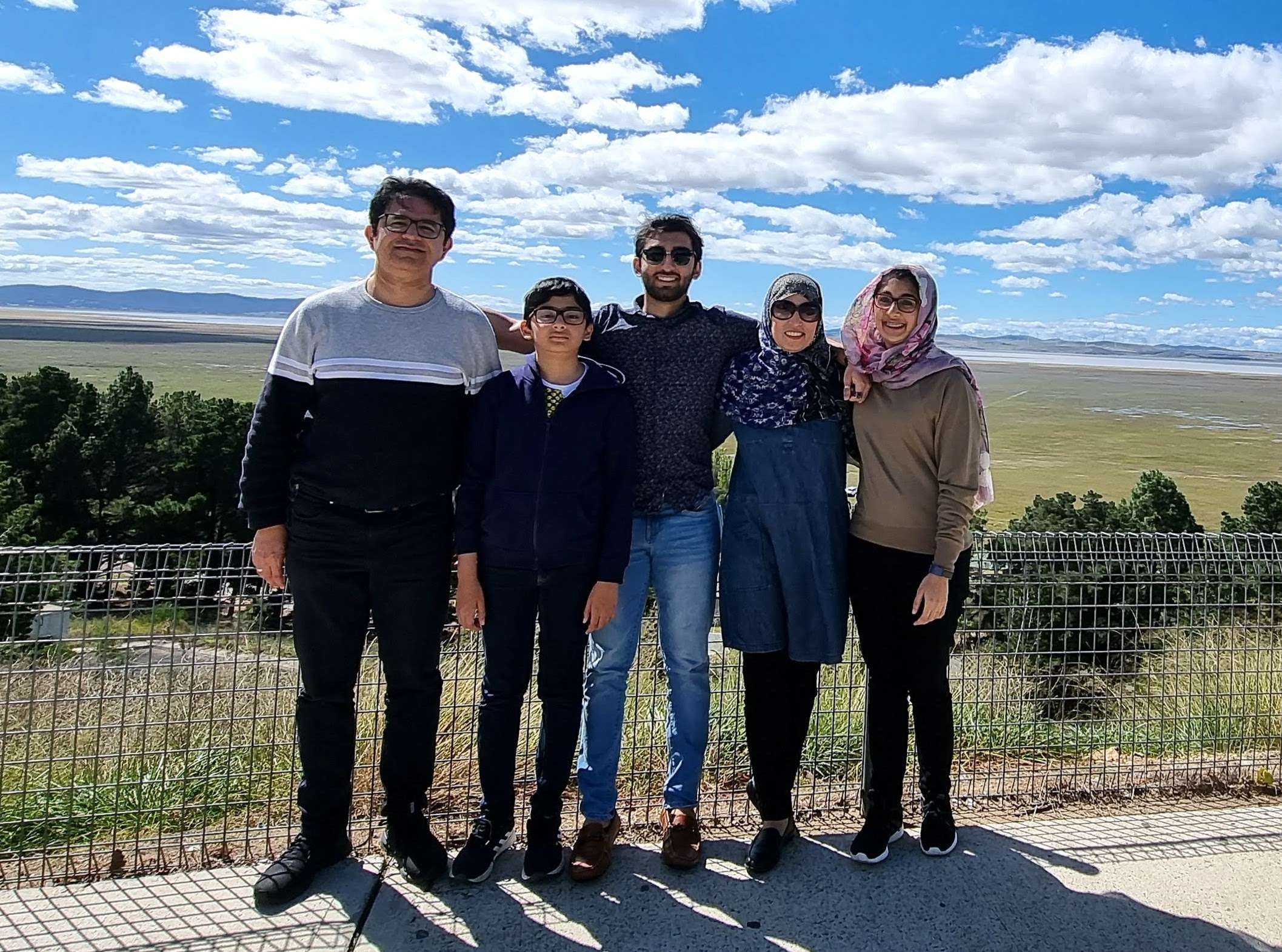 Mubashar with his family, overlooking Lake George near Canberra. This photo was taken in the days after his eldest son arrived in Australia from Canada. Less than a week later, the whole family would have to evacuate from Mallacoota.